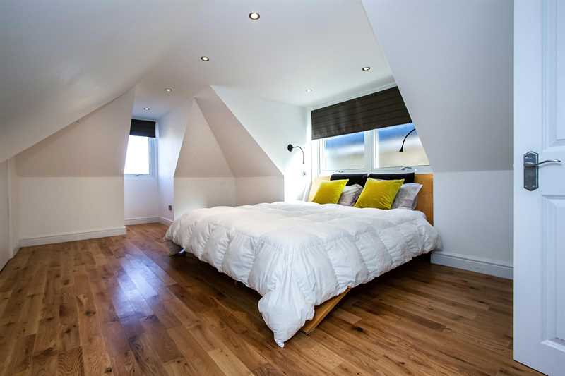 Loft Bedroom with Wooden Floor Northamptonshire Luxury Homes